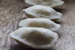 Vareniks. Slavic food. Ukrainian national dish. Traditional dish The process of preparing vareniks. Dough. Flour. Horizontal royalty free stock photos Vareniks. Slavic food. Ukrainian national dish. Traditional dish The process of preparing vareniks. Dough. Flour. Horizontal royalty free stock photos