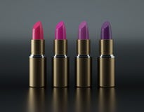 Varied golden lipstick red and violet 2 stock illustration Varied golden lipstick red and violet 2 stock illustration