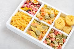 Variety of types and shapes of raw Italian pasta. stock photo Variety of types and shapes of raw Italian pasta. stock photo