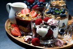 Various Desserts With Berries And Cream Royalty Free Stock Photos