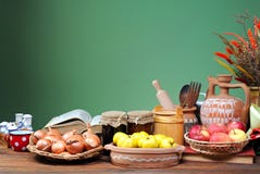 Various kitchen utensils, fruits and vegetables