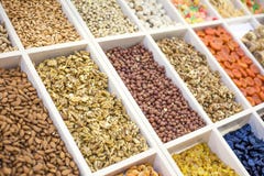 Various nuts and dried fruits on the market: hazelnuts, almonds, peanuts, cashews, raisins, candied fruits, dried fruits, prunes stock photos Various nuts and dried fruits on the market: hazelnuts, almonds, peanuts, cashews, raisins, candied fruits, dried fruits, prunes stock photos