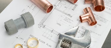 Various Plumbers Tools and Plumbing Materials on Architectural P Stock Photography Various Plumbers Tools and Plumbing Materials on Architectural P Stock Photography