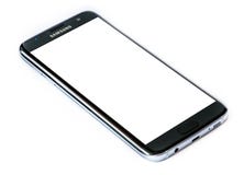 Varna, Bulgaria - March, 09, 2016: Studio shot of a black Samsung Galaxy S7 Edge smartphone, with 12 MP, f 1.7, 26mm Camera, quad stock photo Varna, Bulgaria - March, 09, 2016: Studio shot of a black Samsung Galaxy S7 Edge smartphone, with 12 MP, f 1.7, 26mm Camera, quad stock photo