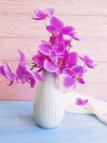 Vase orchid bouquet flower on wooden background stock photography Vase orchid bouquet flower on wooden background stock photography