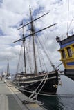 Vecchie barche a vela di legno messe in bacino nel porto immagini stock libere da diritti Vecchie barche a vela di legno messe in bacino nel porto immagini stock libere da diritti