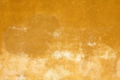 Vecchio fondo sbiadito giallo di struttura della parete in Italia immagini stock Vecchio fondo sbiadito giallo di struttura della parete in Italia immagini stock