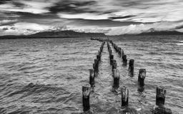 Vecchio pilastro in Puerto Natales immagine stock libera da diritti Vecchio pilastro in Puerto Natales immagine stock libera da diritti