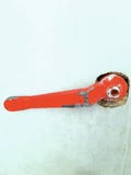Vecchio rubinetto rosso fotografia stock Vecchio rubinetto rosso fotografia stock