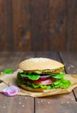 Vegan Burger, Burger with Chickpea Patty, Avocado Spread and Vegetables, Vegetarian Meal stock photography Vegan Burger, Burger with Chickpea Patty, Avocado Spread and Vegetables, Vegetarian Meal stock photography