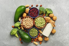 Vegan Protein Source. Healthy Foods Rich In Protein For Vegan And Vegetarian, Vegetables, Milk, Legumes, Seeds, Nuts On A Gray Royalty Free Stock Images Vegan Protein Source. Healthy Foods Rich In Protein For Vegan And Vegetarian, Vegetables, Milk, Legumes, Seeds, Nuts On A Gray Royalty Free Stock Images