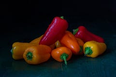Paprika . Vegetable still life dark key on wooden background royalty free stock photos Paprika . Vegetable still life dark key on wooden background royalty free stock photos