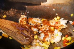Vegetarian cooking is rice with vegetables in a deep frying pan on the street. royalty free stock photography Vegetarian cooking is rice with vegetables in a deep frying pan on the street. royalty free stock photography