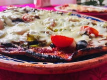 Vegetarian pizza with tomato and cheese. royalty free stock photography Vegetarian pizza with tomato and cheese. royalty free stock photography