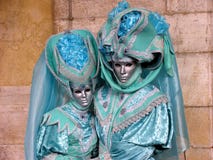 Venice Carnival: Couple in turquoise costumes stock photos Venice Carnival: Couple in turquoise costumes stock photos