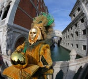 Venice, Italy - February 5, 2018: man with golden Costume royalty free stock images Venice, Italy - February 5, 2018: man with golden Costume royalty free stock images