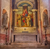 VENICE, ITALY - MARCH 12, 2014: Madonna with the first Franciscans martyrs in church Basilica di Santa Maria Gloriosa dei Frari royalty free stock image VENICE, ITALY - MARCH 12, 2014: Madonna with the first Franciscans martyrs in church Basilica di Santa Maria Gloriosa dei Frari royalty free stock image