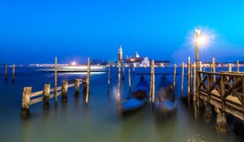 Venice night seascape after sunset. Blurred Gondolas long exposure royalty free stock image Venice night seascape after sunset. Blurred Gondolas long exposure royalty free stock image