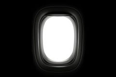 Ventana del aeroplano aislada en fondo oscuro Ventanas de los aviones y espacio en blanco para el dise?o Trayectoria de recortes imagen de archivo libre de regalías Ventana del aeroplano aislada en fondo oscuro Ventanas de los aviones y espacio en blanco para el dise?o Trayectoria de recortes imagen de archivo libre de regalías