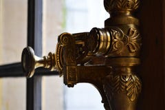 Versailles / France - January 05 2012: Beautiful handle opening the window frame. stock images Versailles / France - January 05 2012: Beautiful handle opening the window frame. stock images