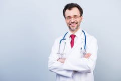 Vertical portrait of excited cheerful qualified expert specialist bearded experienced doctor wearing red tie classic white coat s stock photos Vertical portrait of excited cheerful qualified expert specialist bearded experienced doctor wearing red tie classic white coat s stock photos