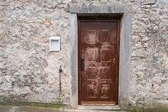Very old weathered brown door made of wood stock photography Very old weathered brown door made of wood stock photography