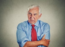 Verärgerter mürrischer ärgerlicher älterer reifer Mann stockfoto Verärgerter mürrischer ärgerlicher älterer reifer Mann stockfoto