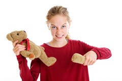 Verärgertes blondes Mädchen mit defektem Teddybären Stockbild Verärgertes blondes Mädchen mit defektem Teddybären Stockbild
