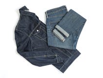 Veste et jeans pliés de denim photo libre de droits Veste et jeans pliés de denim photo libre de droits