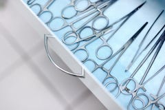 Veterinary surgical tools lying in drawer. Steel medical instruments royalty free stock photo Veterinary surgical tools lying in drawer. Steel medical instruments royalty free stock photo