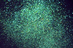 Green bokeh blurred sparkling glittering background stock image Green bokeh blurred sparkling glittering background stock image
