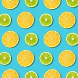 Vibrerande citron och grön limefruktskivatextur på turkosbakgrund royaltyfria foton Vibrerande citron och grön limefruktskivatextur på turkosbakgrund royaltyfria foton