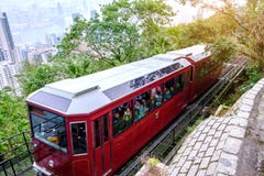 Victoria Peak Tram en niet geïdentificeerde mensen met Hong Kong-de achtergrond van de stadshorizon oriëntatiepunt en bestemming stock afbeeldingen Victoria Peak Tram en niet geïdentificeerde mensen met Hong Kong-de achtergrond van de stadshorizon oriëntatiepunt en bestemming stock afbeeldingen