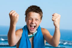 Victorious teen swimmer. stock photo Victorious teen swimmer. stock photo
