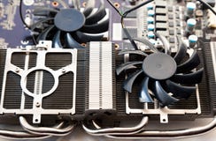 Video card radiator and fan with heatsink close up stock photo Video card radiator and fan with heatsink close up stock photo