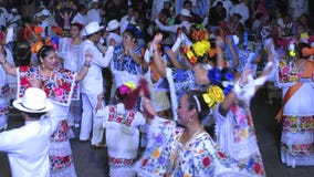 Men and Women Dancing in Merida at Night
