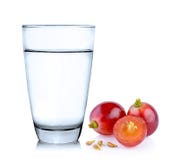 Vidrio de agua y de uvas Imagenes de archivo Vidrio de agua y de uvas Imagenes de archivo