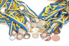 Viel Gold-, Silber- und Bronzemedaillen stockbild Viel Gold-, Silber- und Bronzemedaillen stockbild