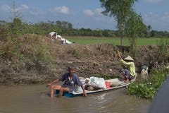 Vietnamese farmers on the Mekong River