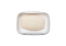 Vieux savon rustique dans le plat en plastique blanc sale Images stock Vieux savon rustique dans le plat en plastique blanc sale Images stock