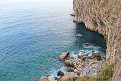 View from Above on the Sea and Stones or Rocks in the City of Taormina. The island of Sicily, Italy. Beautiful and Scenic View of royalty free stock photo View from Above on the Sea and Stones or Rocks in the City of Taormina. The island of Sicily, Italy. Beautiful and Scenic View of royalty free stock photo