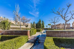 View of the Alcazaba garden with its stairs, small brick walls, and green bushes royalty free stock photography View of the Alcazaba garden with its stairs, small brick walls, and green bushes royalty free stock photography