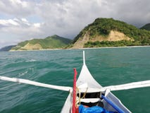 View from banka when travelling to remote part of Abra de Ilog on Mindoro, Philippines royalty free stock photo View from banka when travelling to remote part of Abra de Ilog on Mindoro, Philippines royalty free stock photo