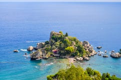 View of beach and island Isola Bella in Sicily stock photo View of beach and island Isola Bella in Sicily stock photo