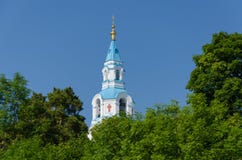View of the bell tower of the Orthodox Cathedral framed by greenery. Spaso-Preobrazhensky Cathedral of the Valaam Monastery stock images View of the bell tower of the Orthodox Cathedral framed by greenery. Spaso-Preobrazhensky Cathedral of the Valaam Monastery stock images