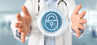 Doctor holding Security padlock wheel icon with stats and binary stock photos Doctor holding Security padlock wheel icon with stats and binary stock photos