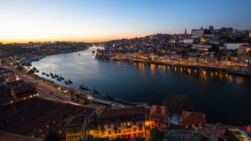 View of Douro river and Ribeira at night time, Porto. View of Douro river and Ribeira at night time, Porto, Portugal Royalty Free Stock Photography View of Douro river and Ribeira at night time, Porto. View of Douro river and Ribeira at night time, Porto, Portugal Royalty Free Stock Photography