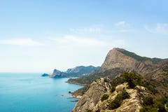 The view from the heights of the mountains, the sea and the blue sky with white clouds royalty free stock image The view from the heights of the mountains, the sea and the blue sky with white clouds royalty free stock image