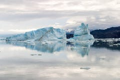 View of an iceberg reflected in the water in Upsala, Argentina stock images View of an iceberg reflected in the water in Upsala, Argentina stock images