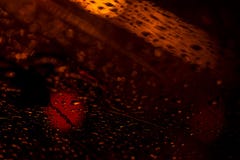 View of the modern city through the window on a very dark stormy night. Concept life of a modern city, urban traffic stock photos View of the modern city through the window on a very dark stormy night. Concept life of a modern city, urban traffic stock photos
